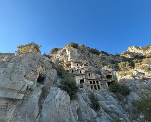 Rock-cut tombs of the Lycian civilization in Myra, carved into the cliffs and showcasing unique ancient burial practices