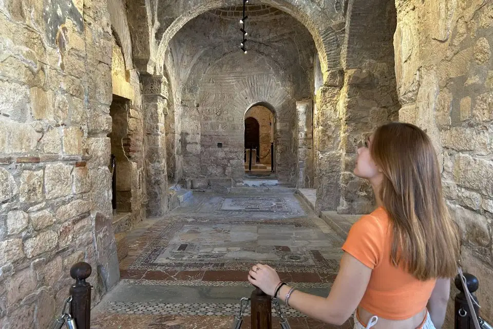 Day Trip from Kalkan - Visitors walking through mosaic-filled halls in St. Nicholas Church, admiring the preserved artwork.