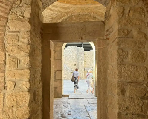 A narrow stone passageway within St. Nicholas Church, part of its ancient architectural design