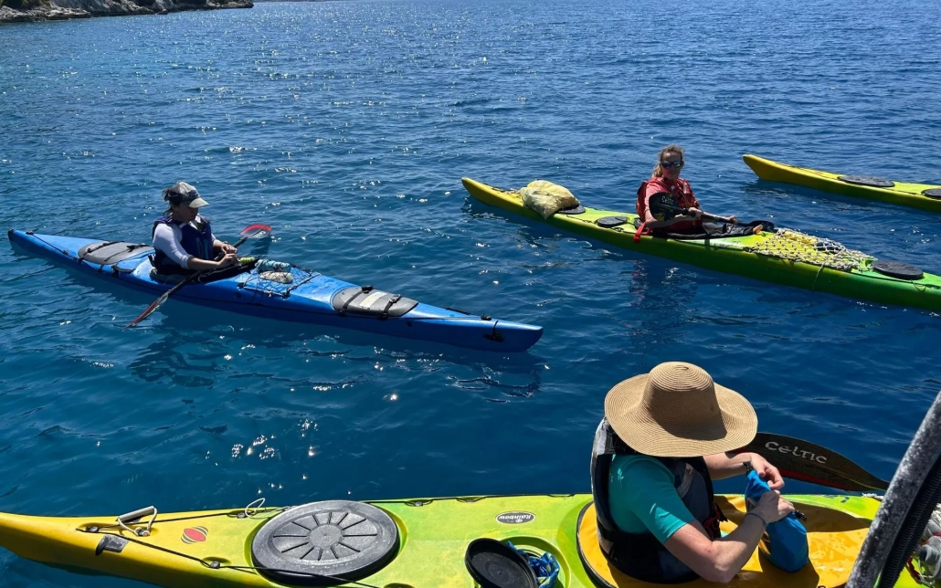 Aerial view of kayakers paddling along the turquoise coastline of Kekova, Turkey